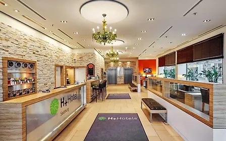 Lobby area at H+ Hotel at the Salzburg main station